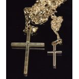 Two 9ct gold chains and two 9ct gold crosses 5.4g