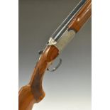 Fias 12 bore over and under ejector shotgun with engraving to the locks, underside, trigger guard,