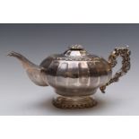 William IV hallmarked silver teapot of lobed form with acanthus leaf handle, London 1830, maker