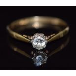 An 18ct gold ring set with a round cut diamond of approximately 0.2ct, 2.1g, size O/P