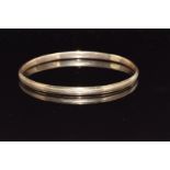 A 9ct gold bangle, 17.2g