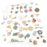 A collection of vintage brooches including, silver, Sarah Coventry, Exquisite, etc