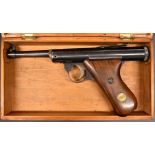 Haenel Mod 28 .177 air pistol with logo inset to the shaped wooden grips and adjustable sights,