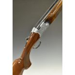 Beretta S686 Special 12 bore over and under ejector shotgun with all over scrolling engraving,