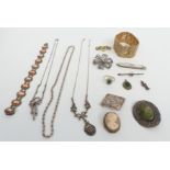 A collection of silver jewellery including brooches, cameo necklace, ring, pendant, etc
