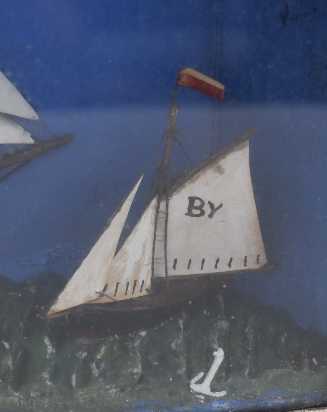 A 19thC diorama of two sailing ships, probably painted metal, in glazed case, 31x38cm - Image 3 of 6