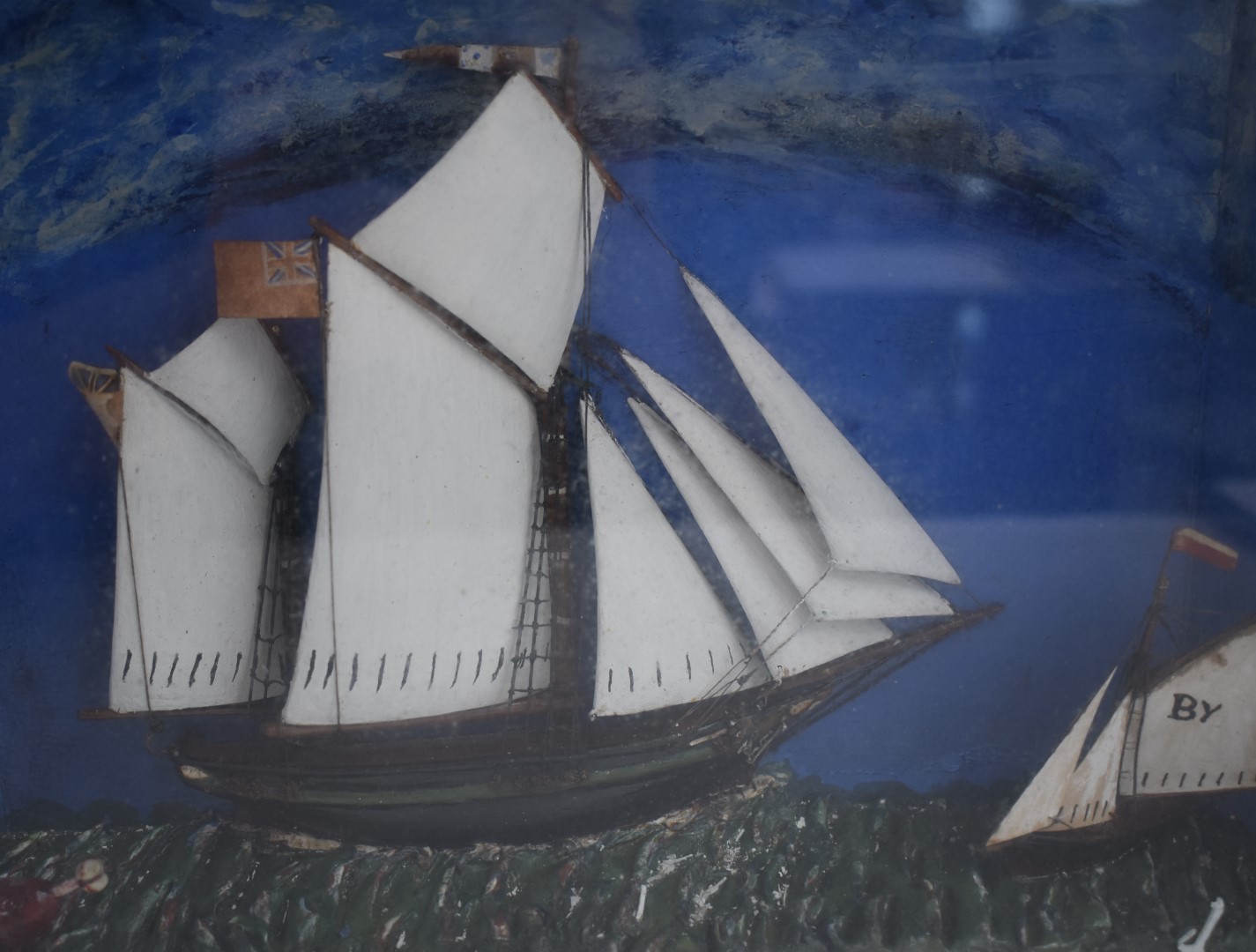 A 19thC diorama of two sailing ships, probably painted metal, in glazed case, 31x38cm - Image 2 of 6