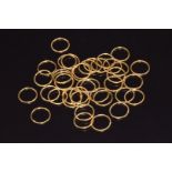 Nineteen pairs of 9ct gold hoop earrings, 12.4g