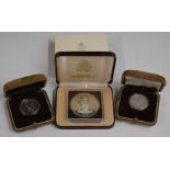 Two cased Russian Olympic silver coins and a Bahamas cased silver ten dollar