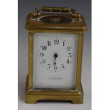 A c1900 brass French carriage clock, the enamel Arabic dial marked 'Exam'd by Mappin & Webb London',