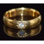 A 22ct gold ring set with paste in a star setting, Birmingham 1910, 5.7g, size M, in Goldsmiths &