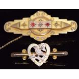 Edwardian 9ct gold brooch in the form of a heart and swallow and a 9ct gold brooch set with a