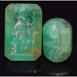 Two intaglio carved emeralds, largest 1.5 x 0.9cm