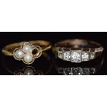An 18ct gold ring set with pearls (2.5g, size N/O) and a yellow metal ring, 1.7g, size P