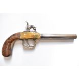 Unnamed percussion hammer action pistol with engraved brass frame, brass trigger guard, chequered