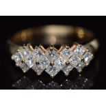 An 14ct gold ring set with 16 princess cut diamonds, total diamond weight approximately 0.96cts, 3.
