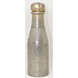 Early 20thC novelty table lighter in the form of a bottle of champagne, the top having reservoir for