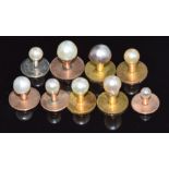 Nine yellow metal/ 9ct gold studs, each set with a pearl, 9.5g