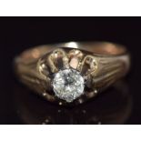 A 9ct gold ring set with a round cut diamond of approximately 0.4ct, 3.3g, size N