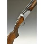 Lincoln 12 bore over and under ejector shotgun with rose engraved locks, line engraved locks,