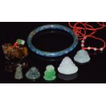 Four jadeite pendants, a tiger's eye Fu dog and a cloisonné bangle