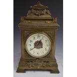 19thC brass cased mantel clock, the anonymous two train movement stamped 354 striking on a gong, the