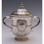 An Indian silver covered loving cup or trophy with vacant cartouche, armorial Libertas Pretiosior