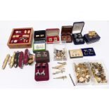 A collection of cufflinks, vintage studs, two 9ct white gold studs and a 9ct gold cufflink (4.7g)