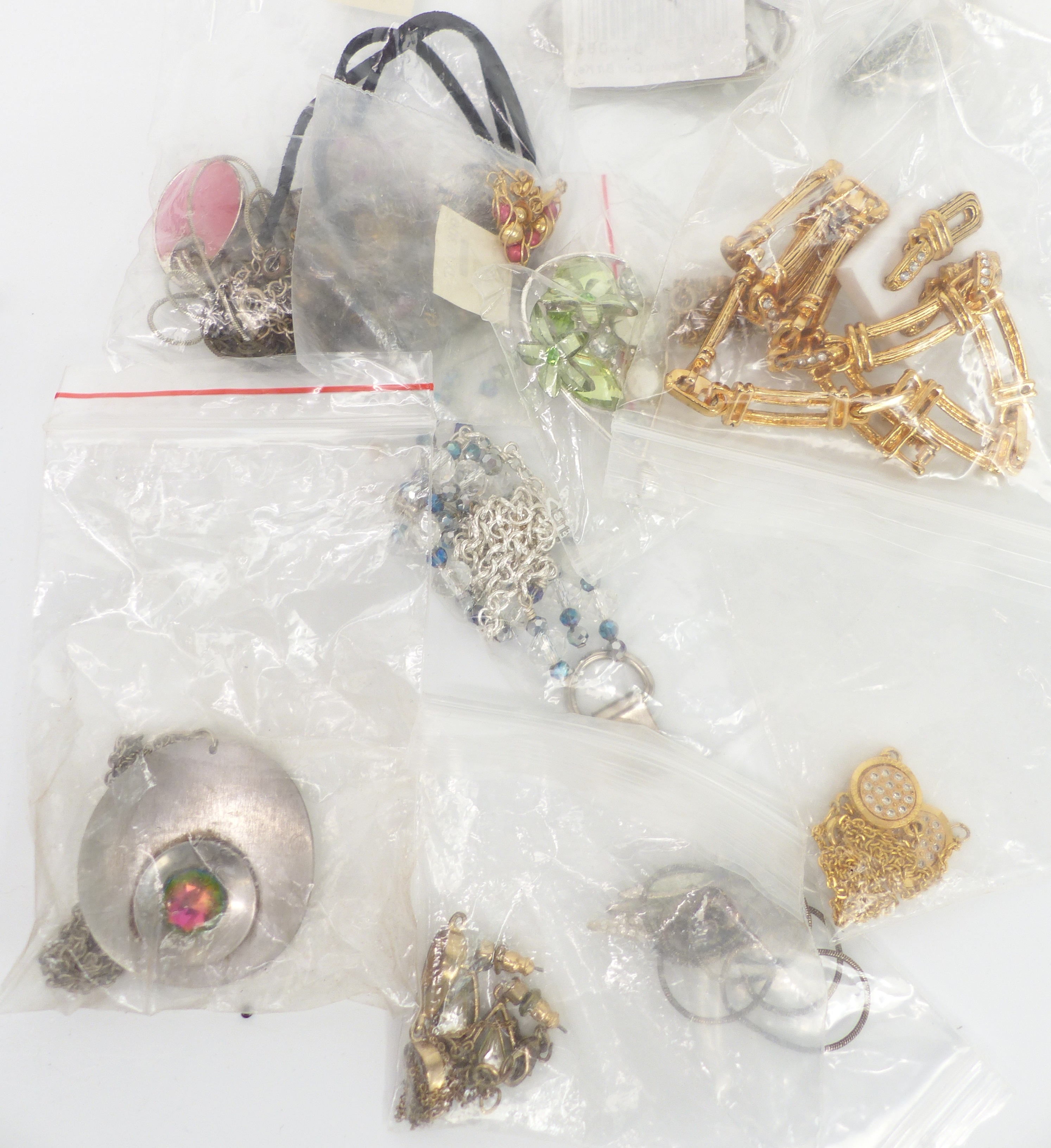 A collection of costume jewellery including chains, necklaces, watches, brooches, etc - Image 2 of 2