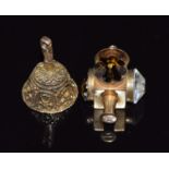 Two 9ct gold charms, one in the form of a bell and the other a lamp, 9.4g