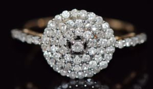 A 9ct gold ring set with diamonds in a cluster, 2.3g, size N