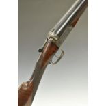 E J Churchill 12 bore side by side ejector shotgun with scrolling engraving to the named locks,