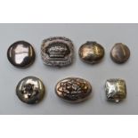 Seven hallmarked silver and white metal pill boxes including one with flower finial, length of