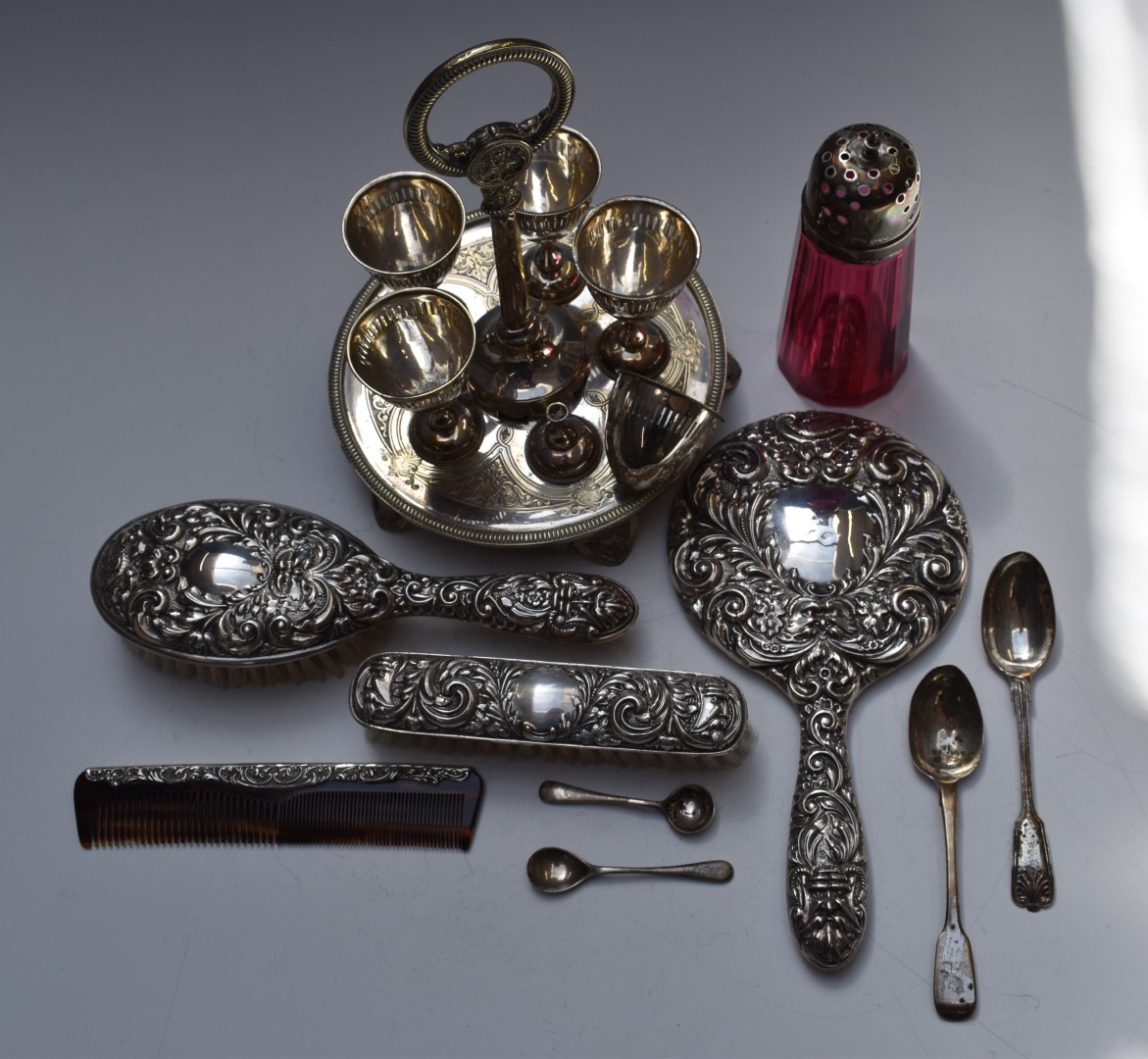 Hallmarked silver mounted dressing table items comprising hand mirror, two brushes and comb,