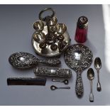 Hallmarked silver mounted dressing table items comprising hand mirror, two brushes and comb,