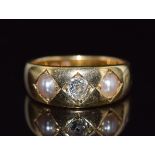 Victorian 18ct gold ring set with an old cut diamond of approximately 0.2ct and two split pearls,