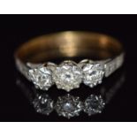 An 18ct gold ring set with diamonds in a platinum setting, 3.1g, size P
