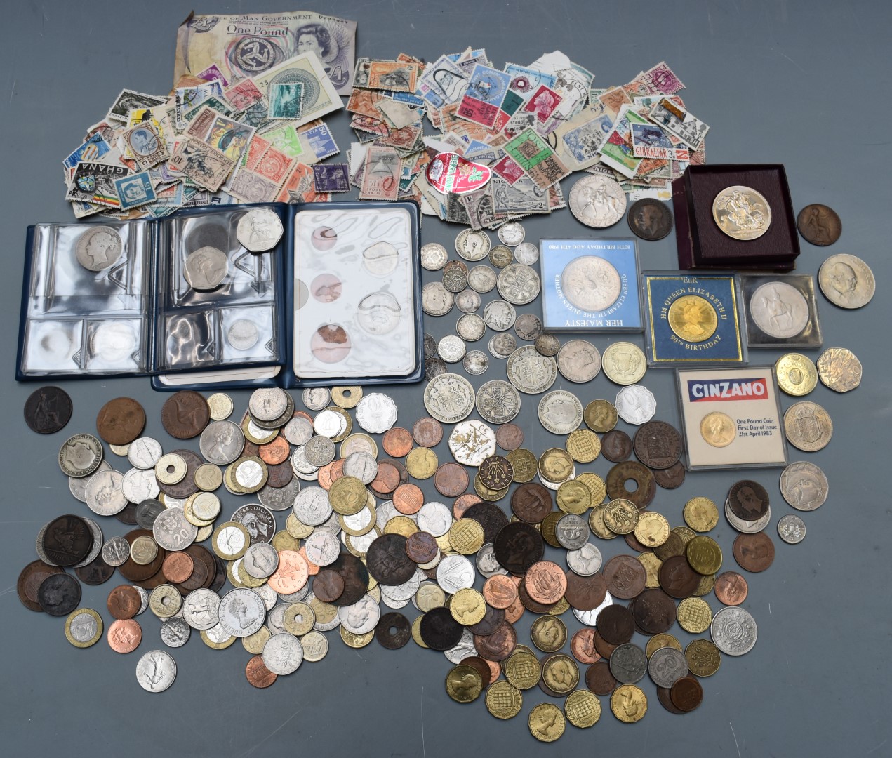 A quantity of UK and overseas coinage to include silver content, Victoria onwards.