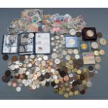A quantity of UK and overseas coinage to include silver content, Victoria onwards.