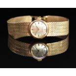 Omega Ladymatic 9ct gold ladies automatic wristwatch with gold hands and hour markers, silver dial