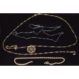 A 14k white gold chain/ necklace (1g), a 9ct gold pendant and 9ct gold chain (3.7g)