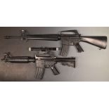 Two ASGK Colt Ar-15 assault rifle airsoft BB guns, one with 4x20 scope and tactical stock.