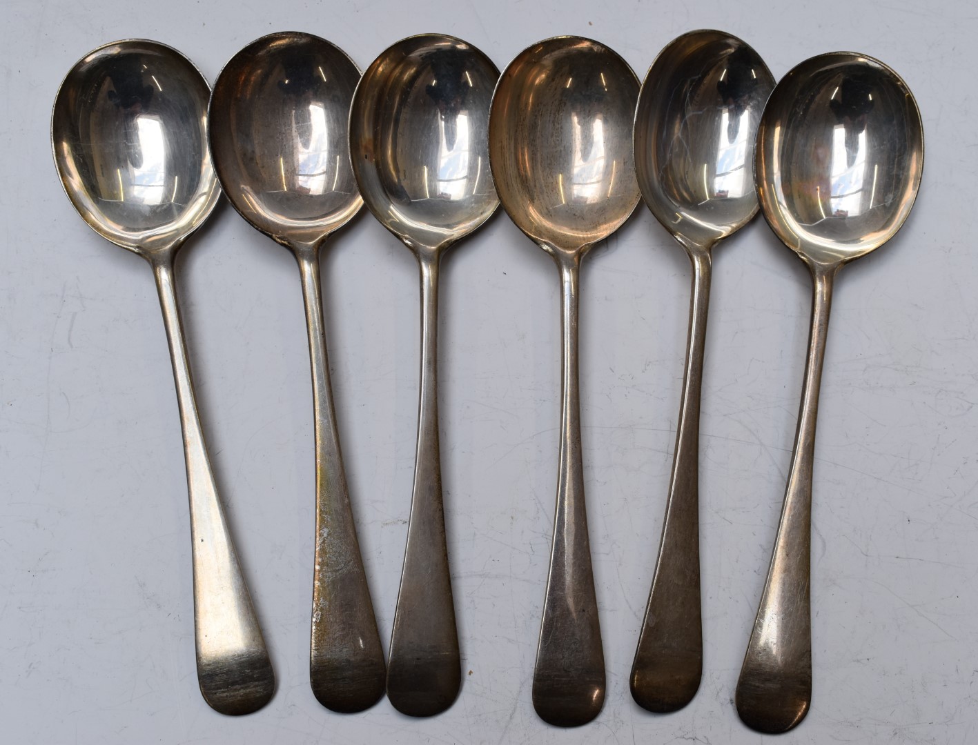 Set of six George V hallmarked silver soup spoons, London 1924, maker Robert Pringle & Sons,