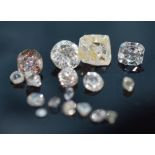 Six loose cut diamonds, a loose uncut diamond and a quantity of small diamonds