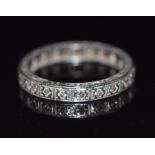 An 18ct white gold eternity ring set with diamonds, 3.5g, size L/M