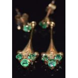 A pair of 9ct gold earrings set with emeralds and diamonds, 1.9g, 2cm long