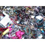 A collection of costume jewellery including necklaces, bangles, bracelets, etc