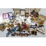 A collection of jewellery including beads, necklaces, brooches, cufflinks, Wedgwood brooch, etc