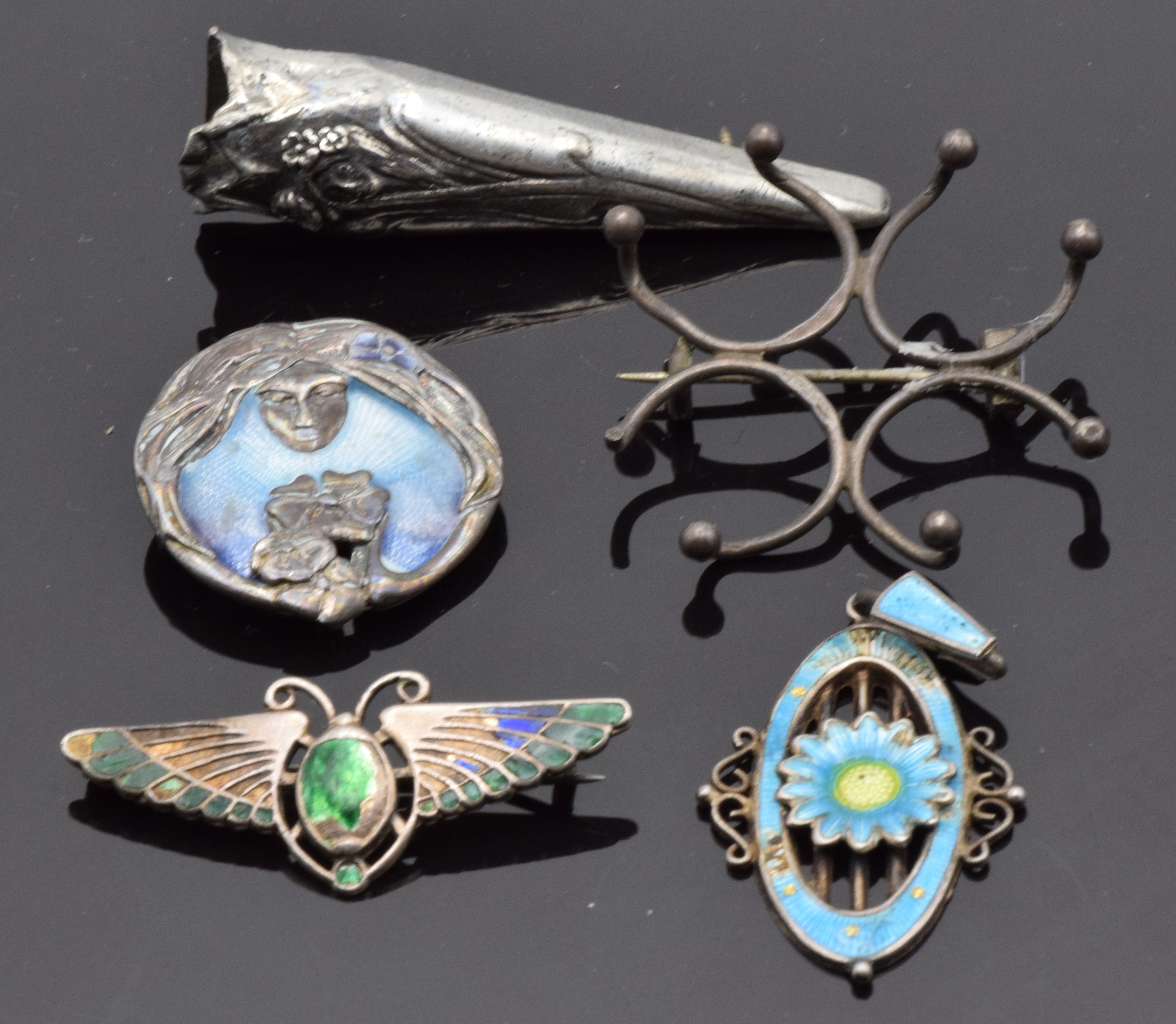 Two silver and enamel brooches, Charles Horner scarab beetle brooch, a posy holder and a section