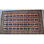 Turkoman rug with four rows of nine guls on a wine ground, 197 x 111cm